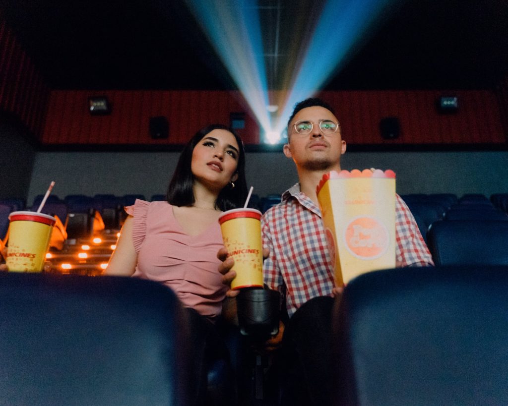 man and woman in cinema