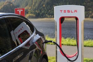 A Tesla Charging Station In A Parking Lot