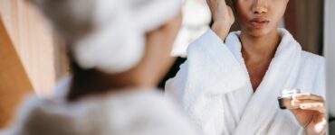 Woman in front of mirror